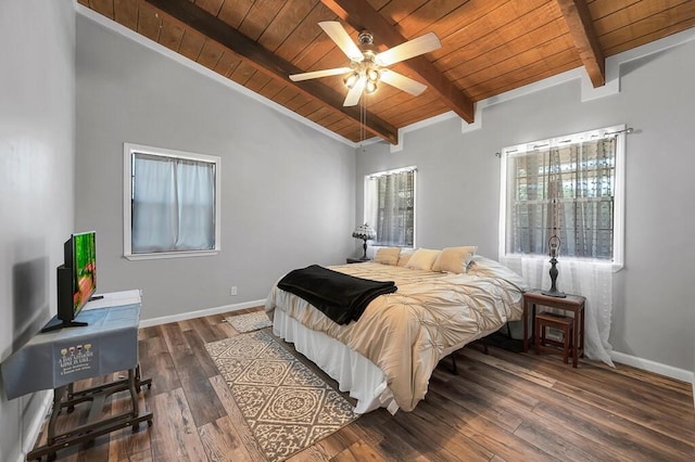 bedroom featuring multiple windows, ceiling fan, and dark wood-type flooring