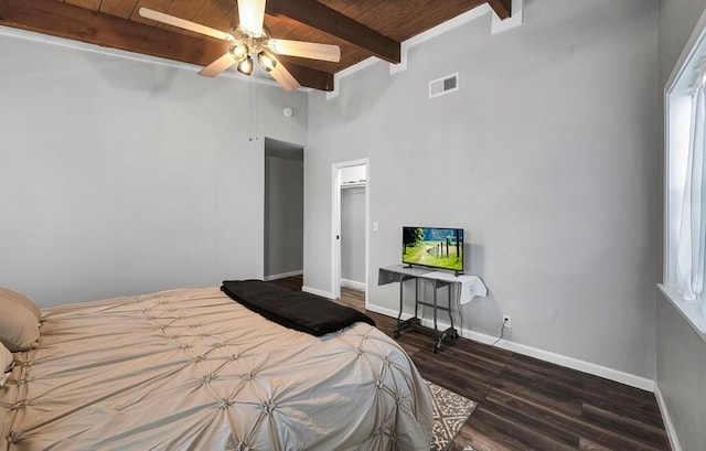 bedroom featuring multiple windows, ceiling fan, and wood ceiling