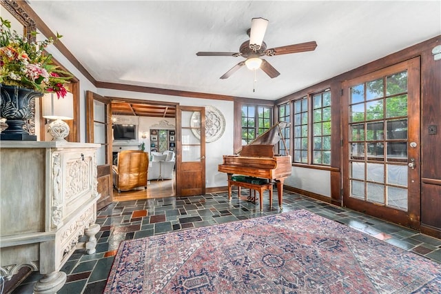 interior space featuring a wealth of natural light and ceiling fan