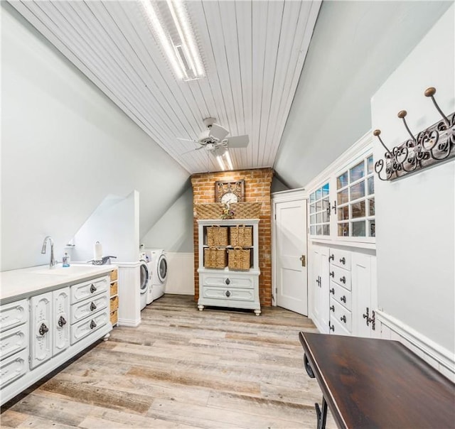 washroom with ceiling fan, sink, wooden ceiling, light hardwood / wood-style flooring, and washer and clothes dryer