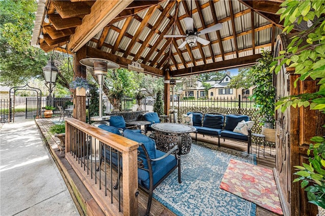 view of patio / terrace with a gazebo, ceiling fan, and an outdoor living space