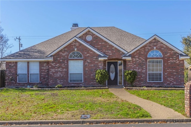 front of property featuring a front lawn