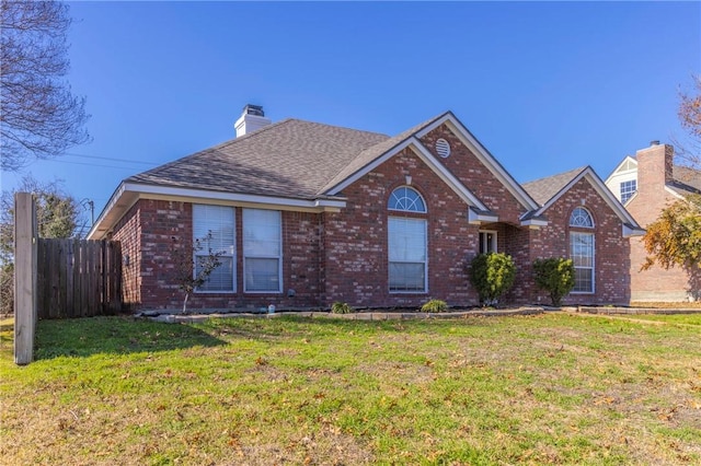 view of front of home with a front yard