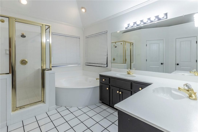 bathroom with ornamental molding, vanity, shower with separate bathtub, and tile patterned flooring