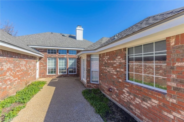 doorway to property with a patio area