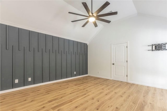 additional living space featuring high vaulted ceiling, ceiling fan, and light hardwood / wood-style flooring