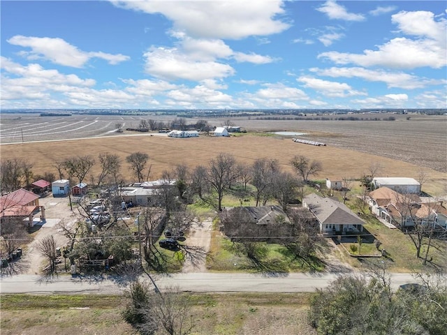 birds eye view of property featuring a rural view