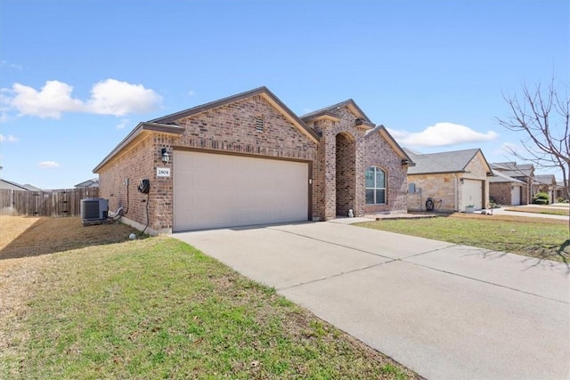 view of front of house with brick siding, central AC unit, a garage, driveway, and a front lawn