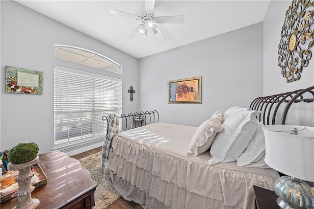 bedroom featuring ceiling fan and hardwood / wood-style floors