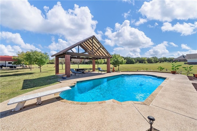 view of swimming pool featuring a gazebo, a diving board, a yard, and a patio