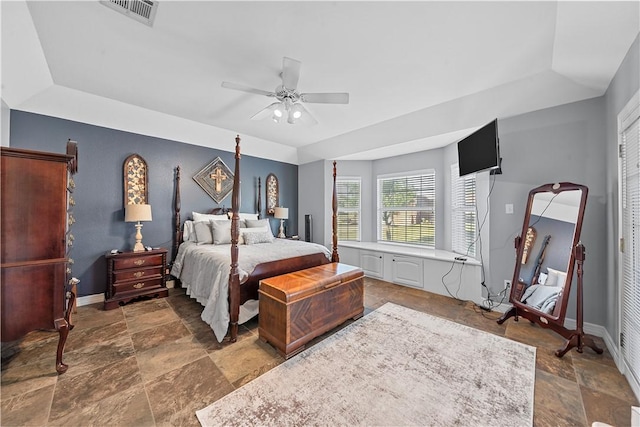 bedroom with ceiling fan and a closet