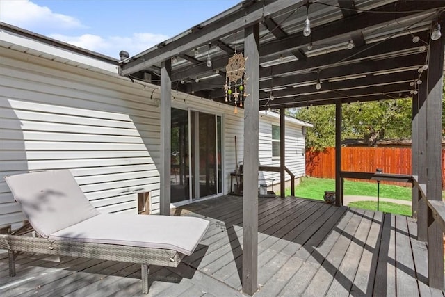 wooden deck featuring fence