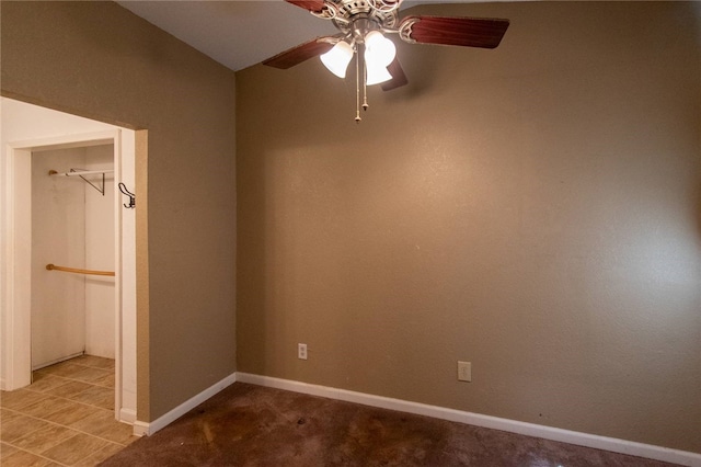 unfurnished bedroom featuring ceiling fan and light tile patterned floors