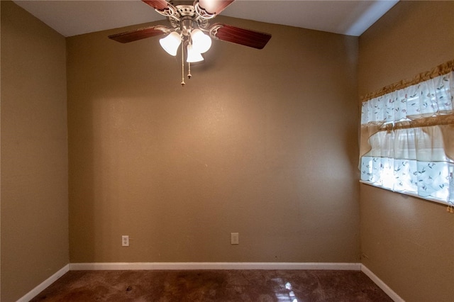 empty room featuring ceiling fan and carpet floors