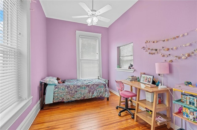 bedroom with hardwood / wood-style floors and ceiling fan