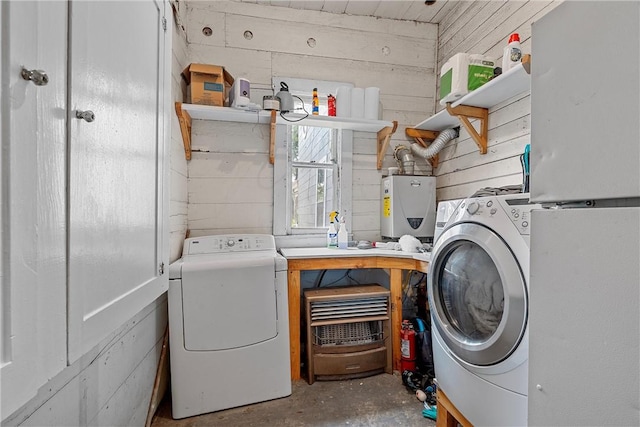 laundry room with wood walls