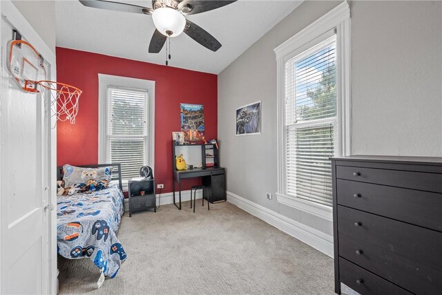 bedroom featuring ceiling fan and carpet floors