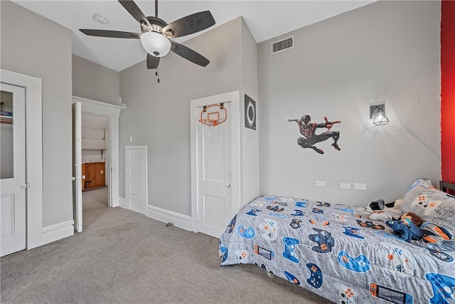 unfurnished bedroom featuring light carpet and ceiling fan