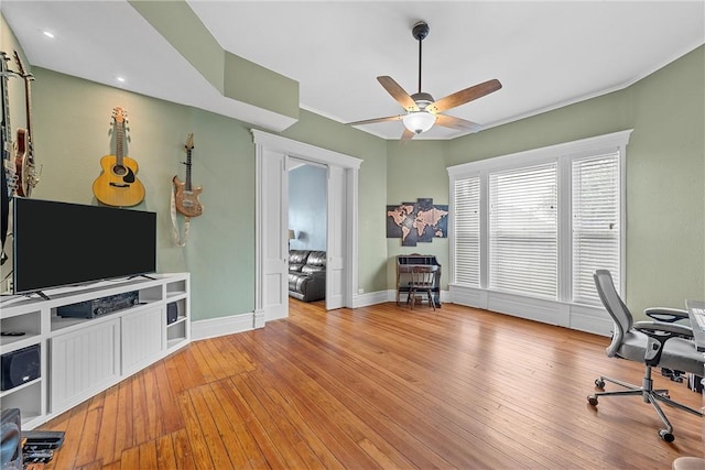 office area with ceiling fan and light wood-type flooring