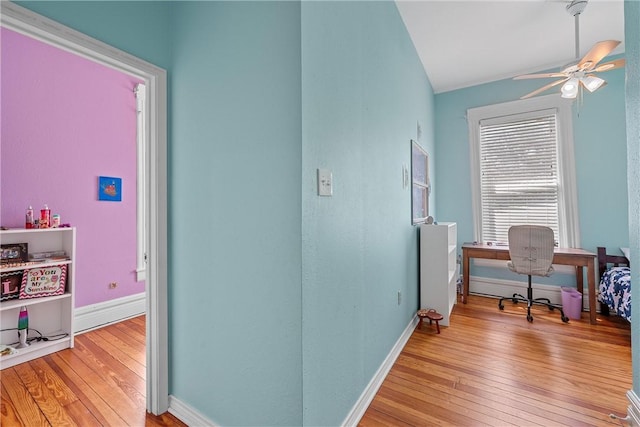 office area with ceiling fan and light wood-type flooring