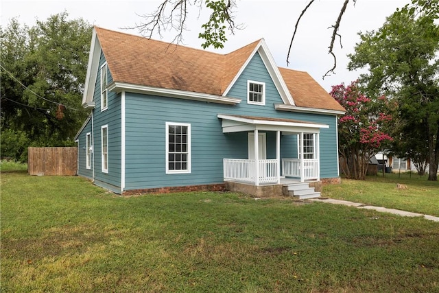 view of front of house featuring a porch and a front lawn