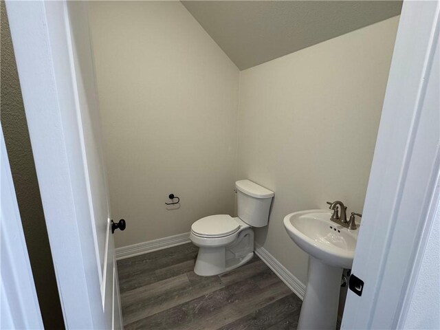 unfurnished bedroom with visible vents, ensuite bath, light carpet, and baseboards