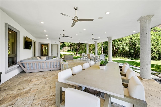 view of patio featuring an outdoor living space and ceiling fan