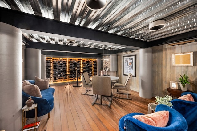 interior space featuring beam ceiling and hardwood / wood-style flooring