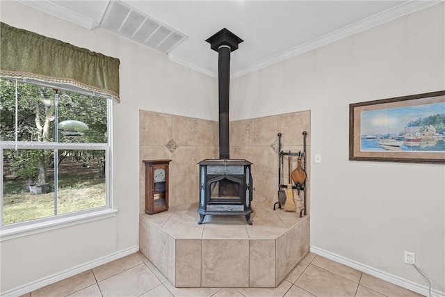 interior details featuring a wood stove and ornamental molding