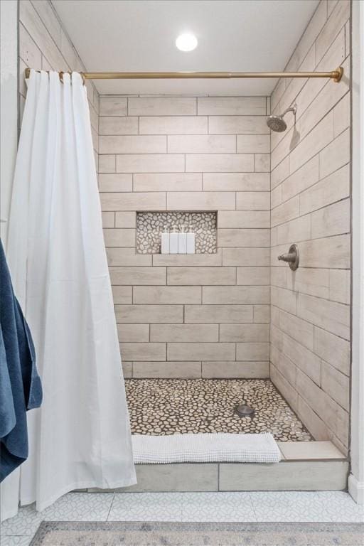 bathroom with a shower with curtain