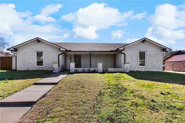 single story home with a front yard