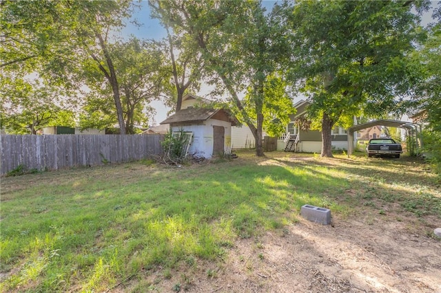 view of yard featuring a carport