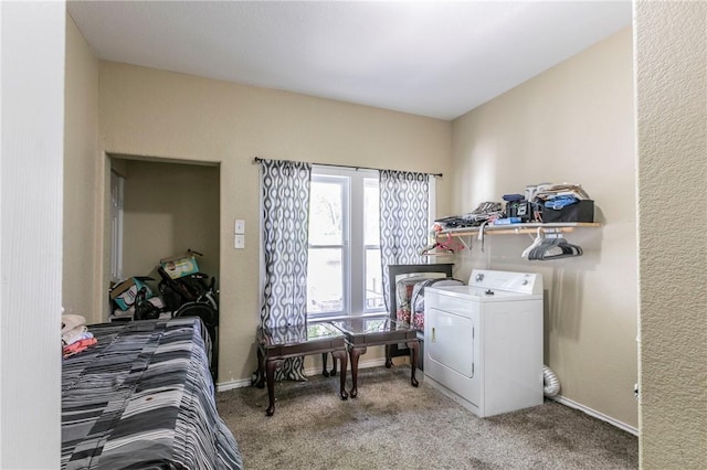 laundry room featuring carpet and washer / clothes dryer