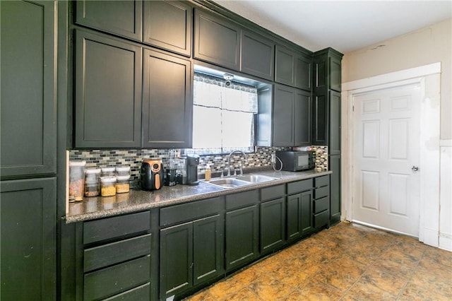 kitchen with tasteful backsplash and sink