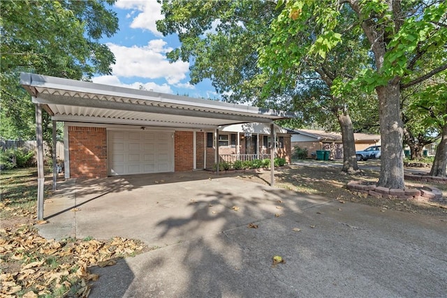 view of front of home with a porch and a garage