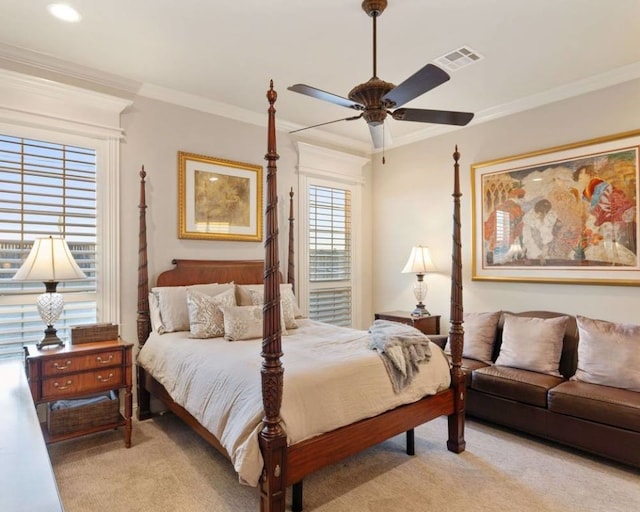 bedroom featuring ornamental molding and light colored carpet