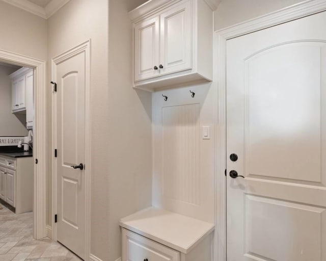 mudroom with crown molding