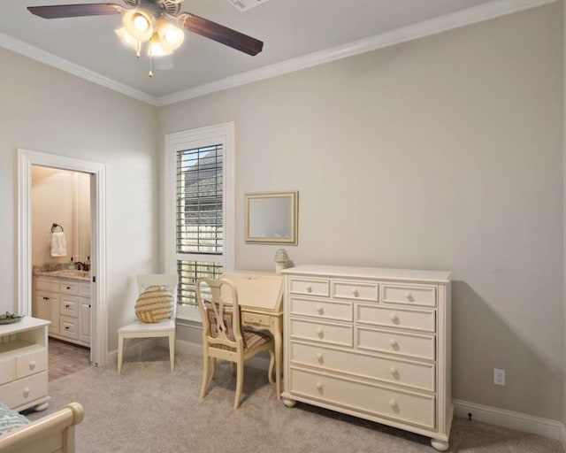 office featuring light carpet, ornamental molding, and ceiling fan