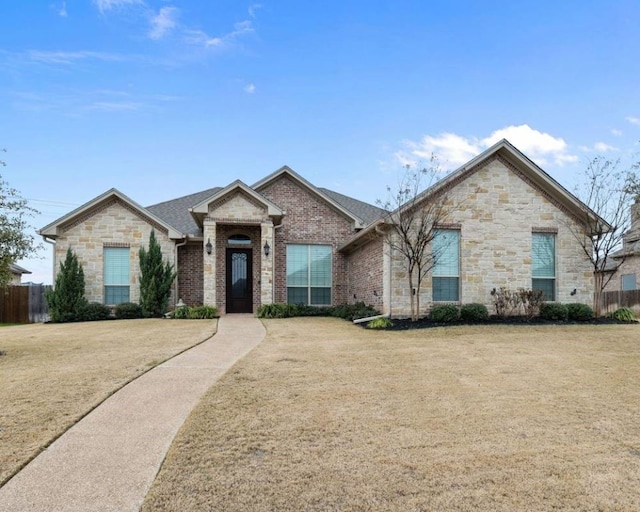 view of front of home with a front yard