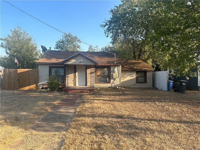 view of front of home with a front lawn