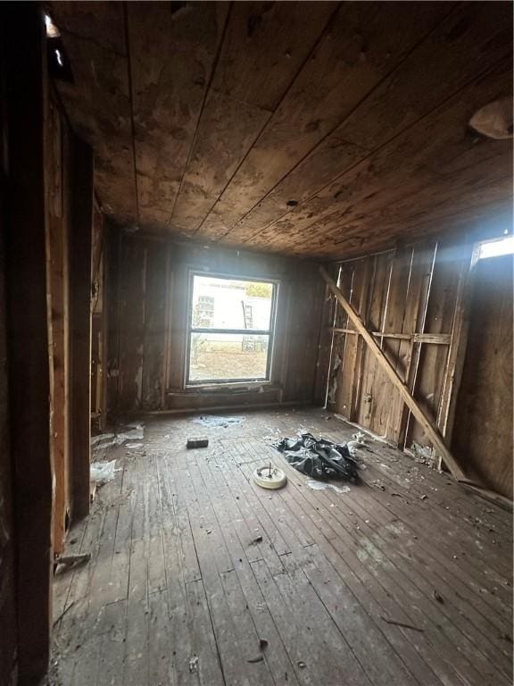 misc room featuring wooden ceiling and hardwood / wood-style flooring