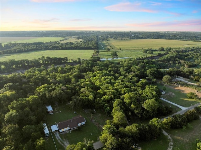 aerial view at dusk with a rural view