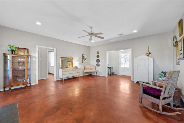 living area with a ceiling fan, recessed lighting, visible vents, and finished concrete floors