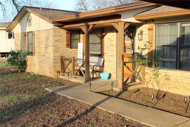 entrance to property featuring a patio area