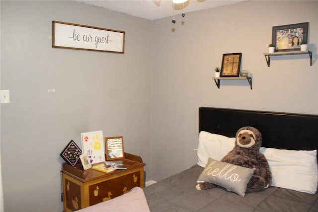 bedroom featuring ceiling fan