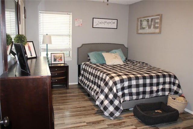 bedroom featuring hardwood / wood-style floors