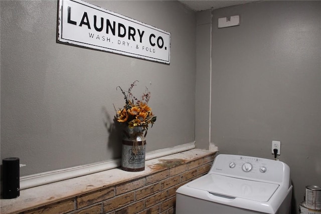 laundry room with washer / dryer