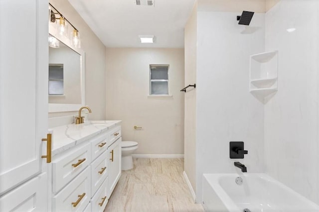 full bathroom featuring shower / bathing tub combination, vanity, and toilet