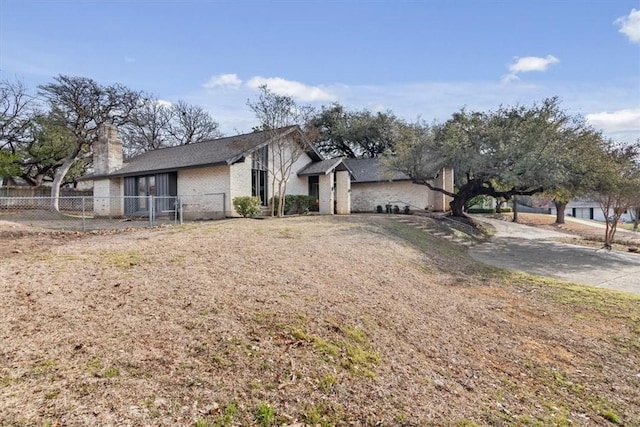 view of front of home with a front lawn