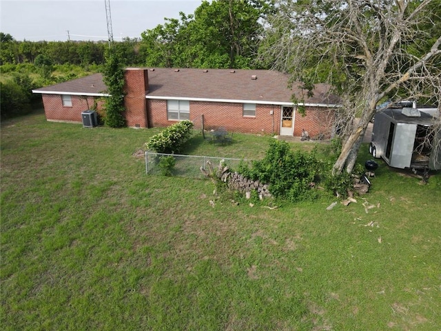 view of yard with central AC